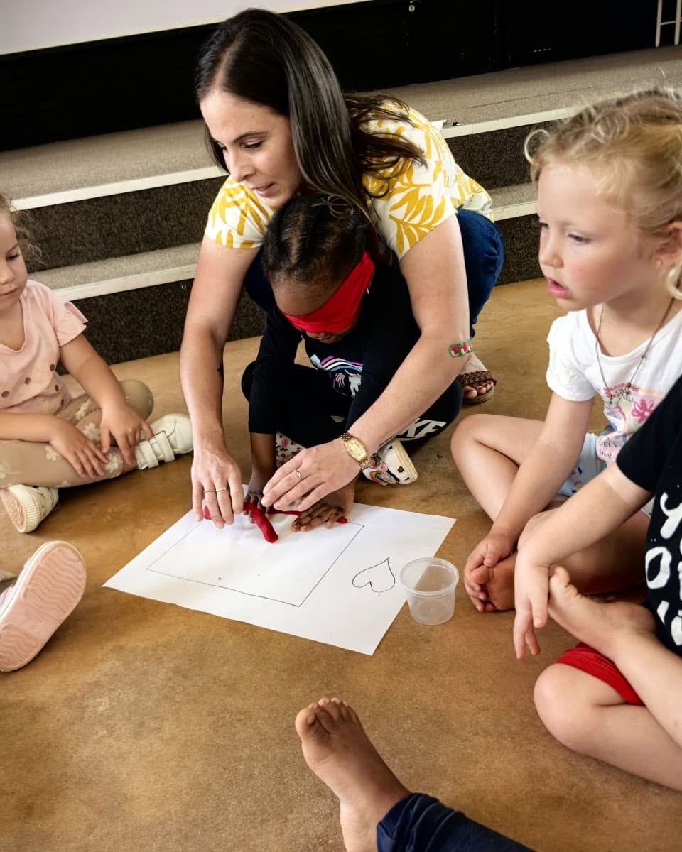 A teacher reading with learners